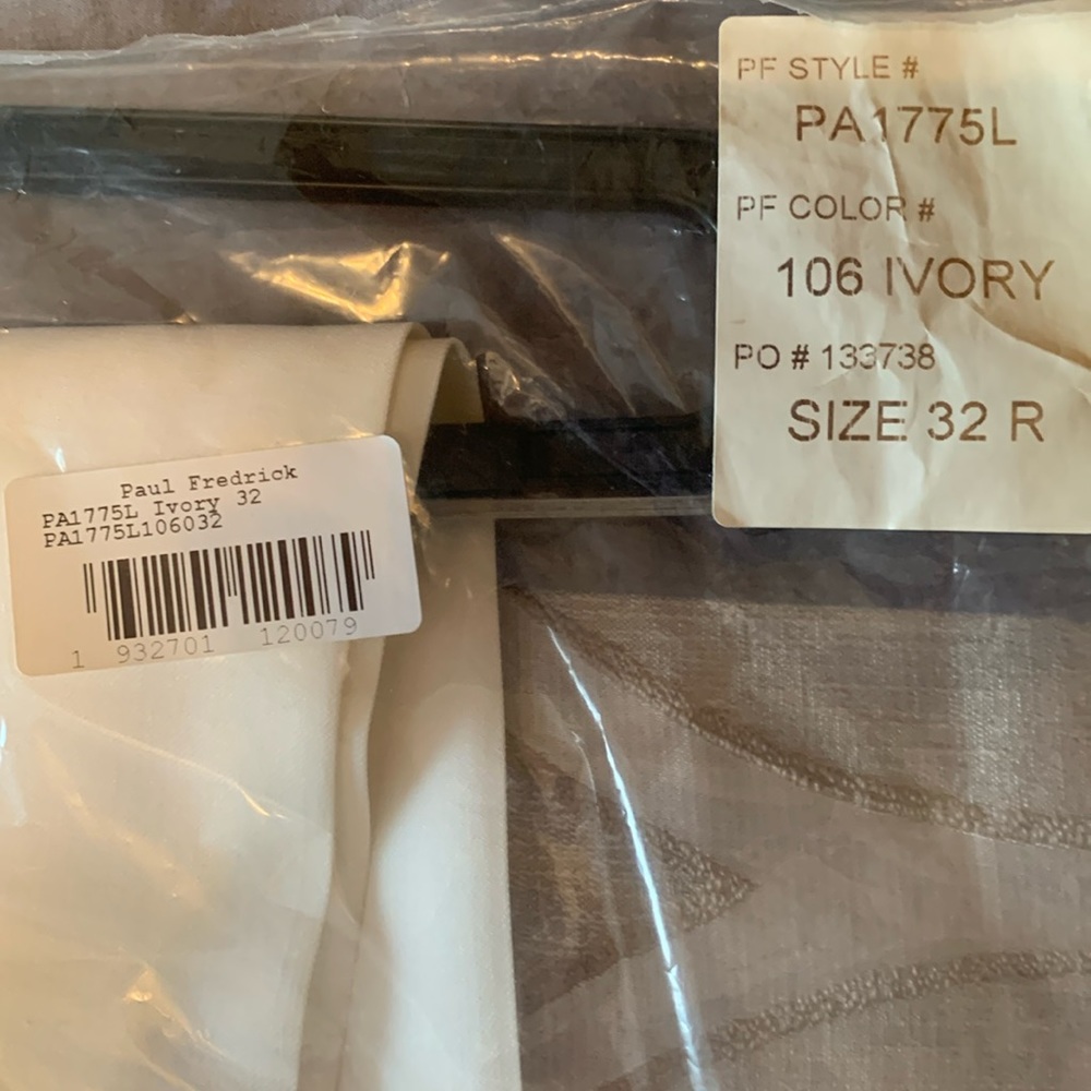 Men’s dress slacks still in bag not hemmed. Pleated.